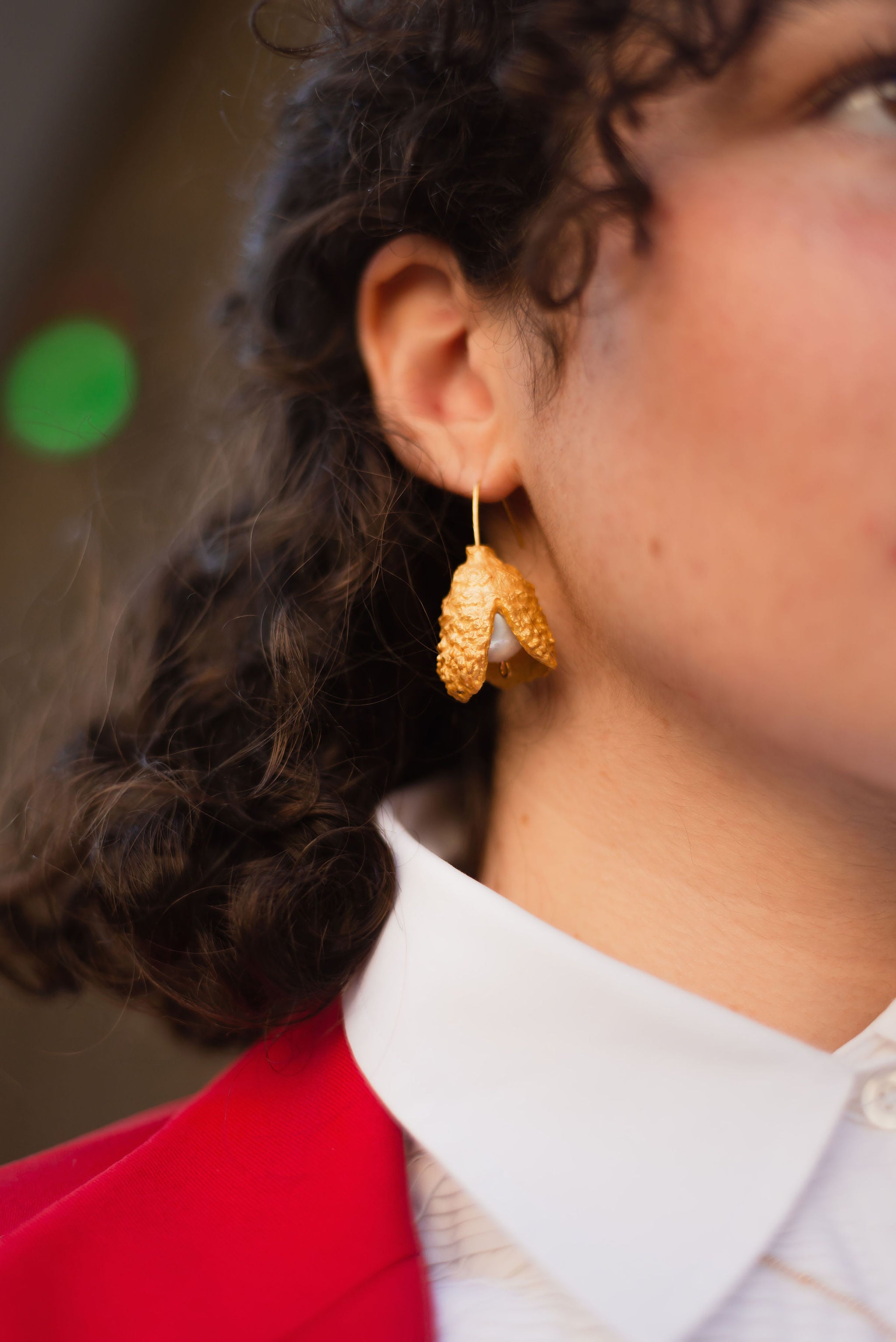 Cork Acorn Majorica Pearl white and gold earrings with model lifestyle elegant timeless and shophisticated look