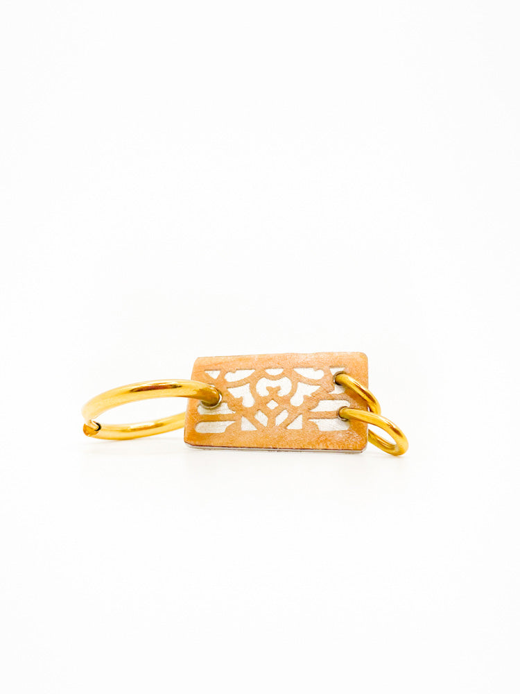 Aureva Hoop Pendant - Feather WITH HOOP mix and match single earring front sandal wood 